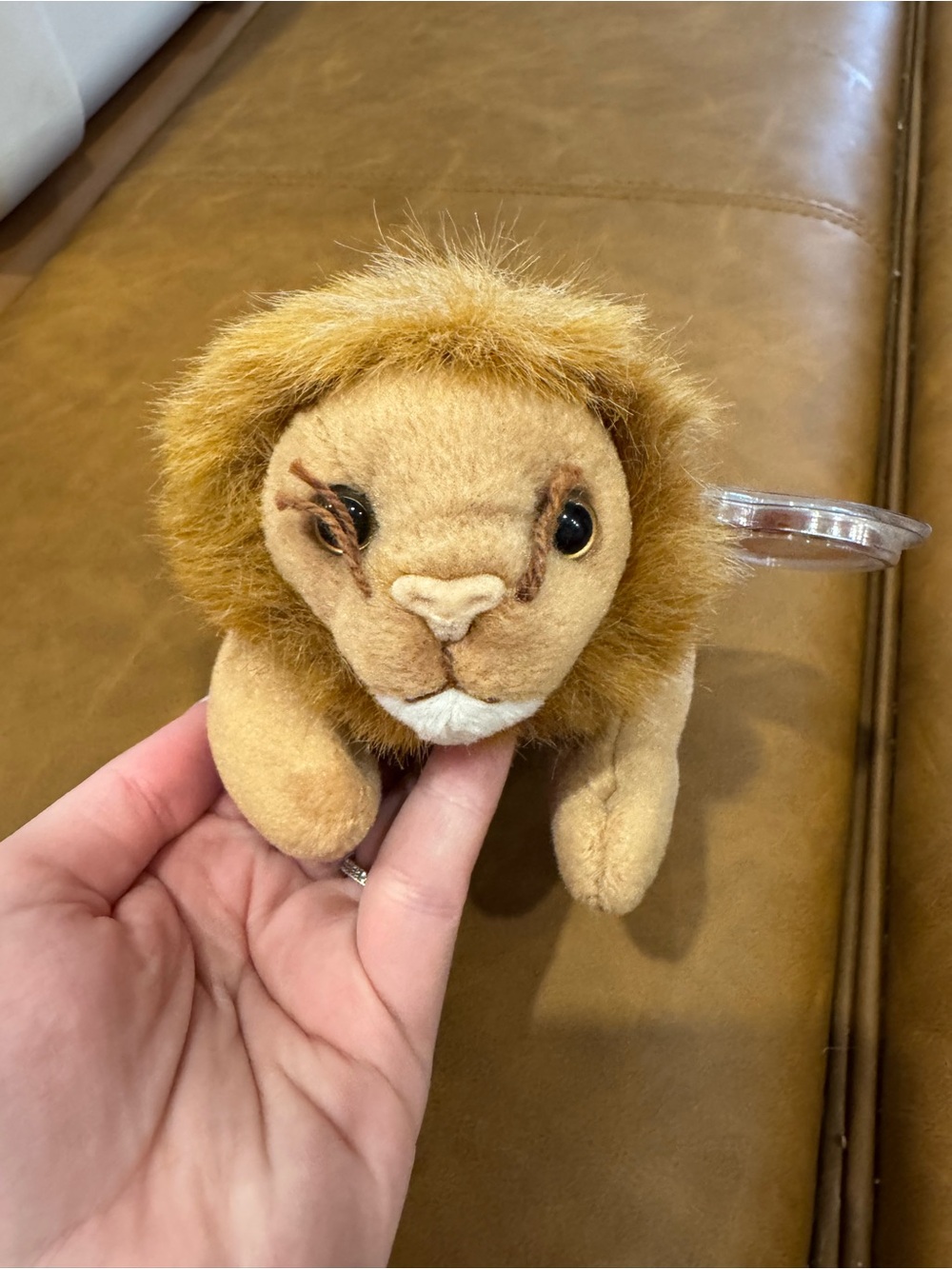 This is a 1996 Ty Beanie Baby "Roary" the Lion plush toy.